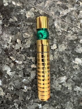MAC Gold Lipstick Stick with Green Accent